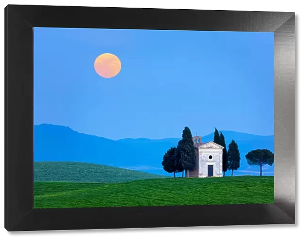 Italy, Tuscany, Val d Orcia. Moonrise over Chapel of Vitaleta
