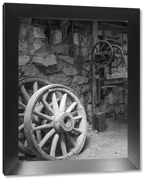 USA, California, Bishop. Black and white inside blacksmith shop at Laws Railroad Museum