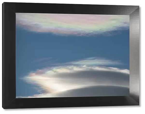 South Georgia, St. Andrew's Bay, Cloud iridescence or irisation, aka rainbow clouds. Common type of photometeor. Lenticular clouds