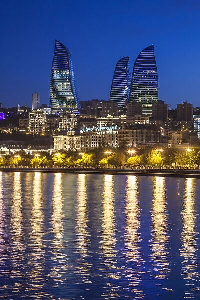 Azerbaijan, Baku. Bulvar Promenade, city skyline with Flame Towers