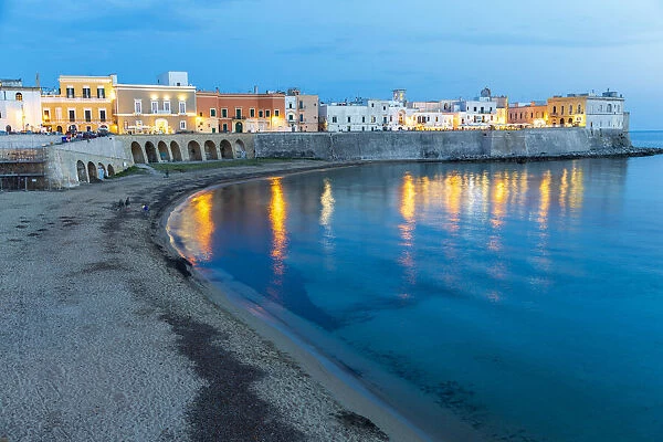 Italy, Apulia, Province of Lecce, Gallipoli. Beach and old town section over the Ionian