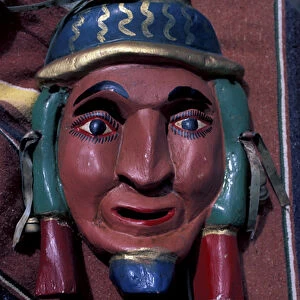 NA, Mexico, Taxco. Painted wooden mask