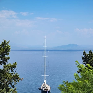 Sailboat moored in Ionian Sea, Corfu, Greece, Europe