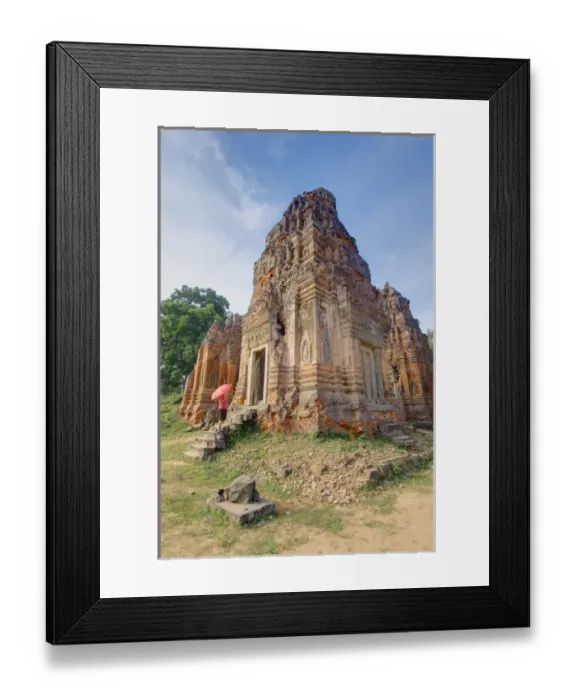 Framed Print : Cambodia, Angkor Wat. Female tourist with umbrella views part of Lolei Temple. Credit as Framed Print : Cambodia, Angkor Wat. Female tourist with umbrella views part of Lolei Temple. Credit as