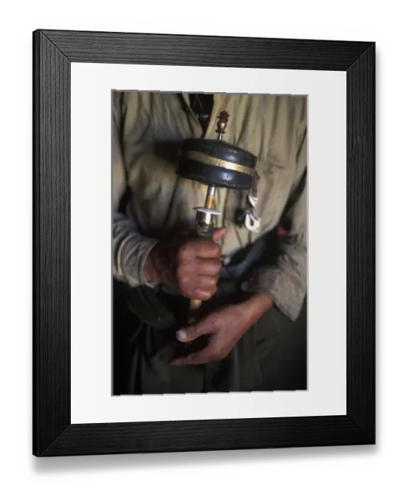 Framed Print : Tibet, Kham Tibetan man with prayer wheel, Kandze Framed Print : Tibet, Kham Tibetan man with prayer wheel, Kandze