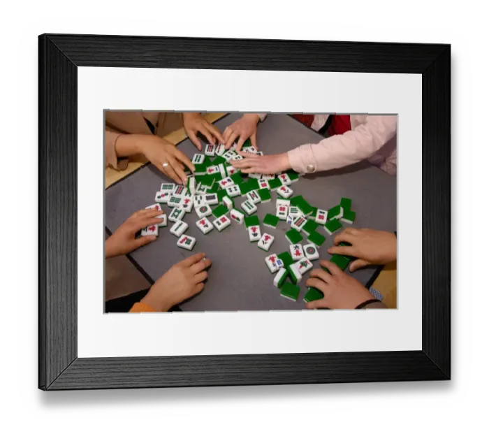 Framed Print : Mahjong players. A game of Chinese origin played by four persons with 144 dominolike Framed Print : Mahjong players. A game of Chinese origin played by four persons with 144 dominolike