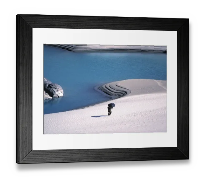 Framed Print : Pakistan, N-W Frontier Province, Indus River. A woman shields herself from the hot Framed Print : Pakistan, N-W Frontier Province, Indus River. A woman shields herself from the hot