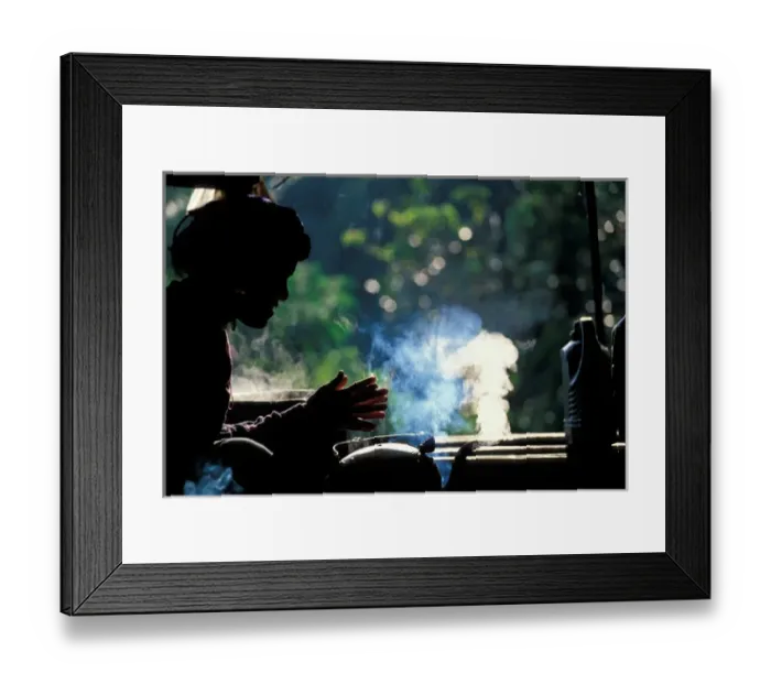 Framed Print : Thailand, Doi Inthanon National Park, Young woman sits by steaming tea kettle Framed Print : Thailand, Doi Inthanon National Park, Young woman sits by steaming tea kettle