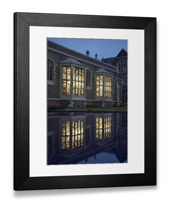 Framed Print : New Zealand, Canterbury, Christchurch, Windows of Sofa Gallery, Arts Centre at Dusk