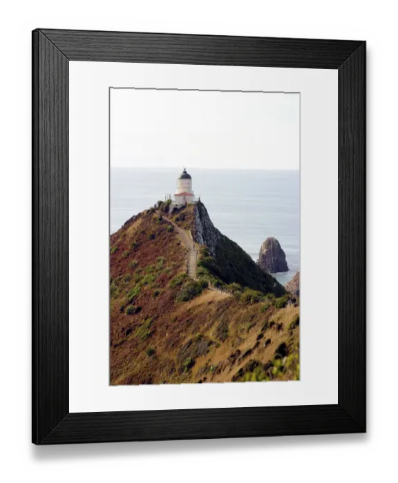Framed Print : Catlins, Otago, Nugget Point, New Zealand. A lighthouse in the deep southern region of the Catlins