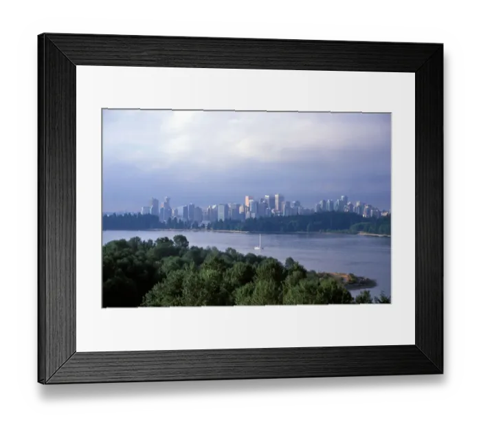 Framed Print : Sail boat on the river in front of the skyline of the city of Vancouver, British Columbia