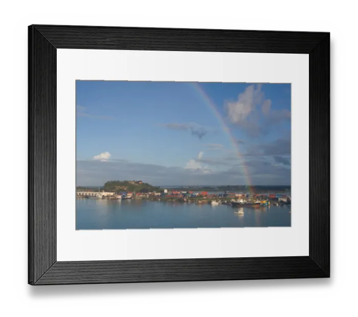 Framed Print : A rainbow over the harbor in St. Johns, Antigua, in the southern Caribbean Framed Print : A rainbow over the harbor in St. Johns, Antigua, in the southern Caribbean