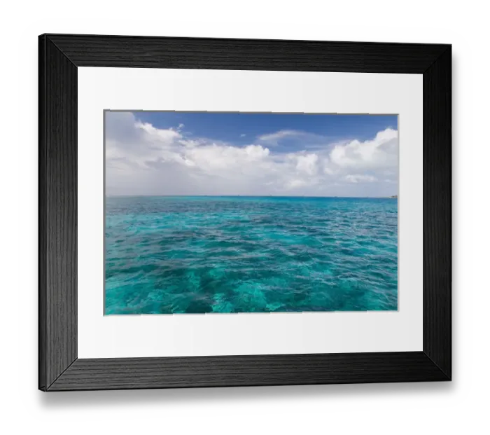 Framed Print : The blue waters of the Caribbean Sea over a coral reef near the island of Antigua Framed Print : The blue waters of the Caribbean Sea over a coral reef near the island of Antigua
