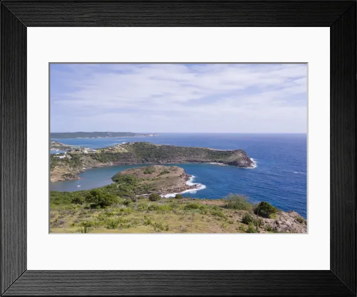 Framed Print : North America, Caribbean, Angitua, Eric Claptons home is seen on the promontory Framed Print : North America, Caribbean, Angitua, Eric Claptons home is seen on the promontory