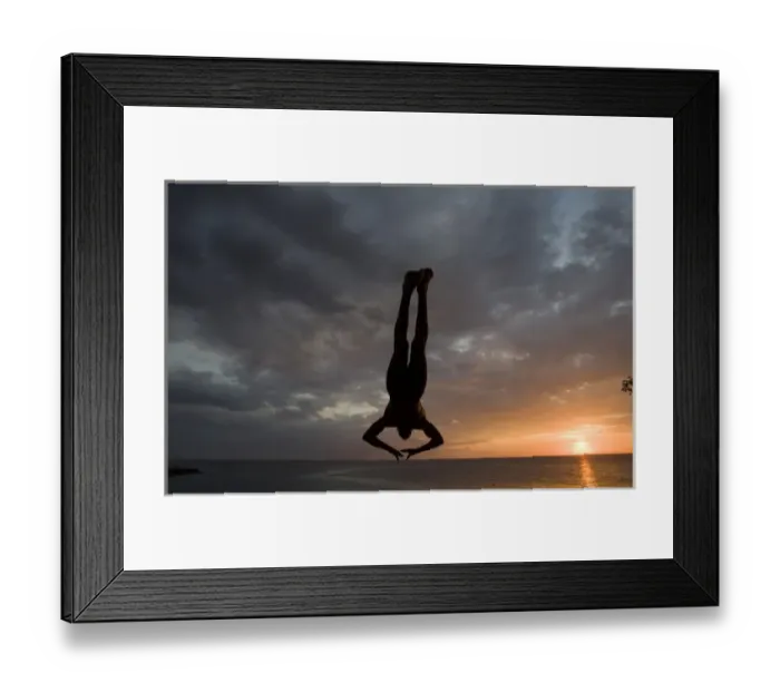 Framed Print : Jamaica, Negril, Silhouette of young man leaping from from cliff above Pirates Cave Framed Print : Jamaica, Negril, Silhouette of young man leaping from from cliff above Pirates Cave