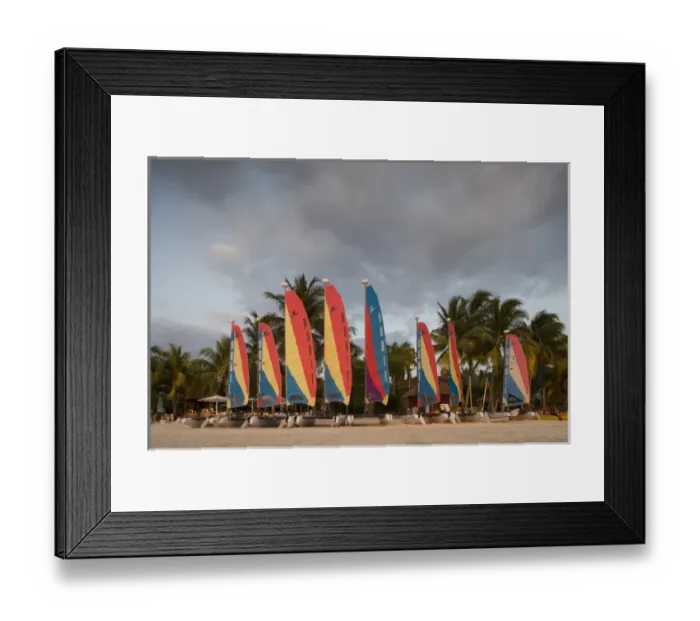 Framed Print : Jamaica, Negril, Setting sun lights row of sailboats at tourist resort along white Framed Print : Jamaica, Negril, Setting sun lights row of sailboats at tourist resort along white