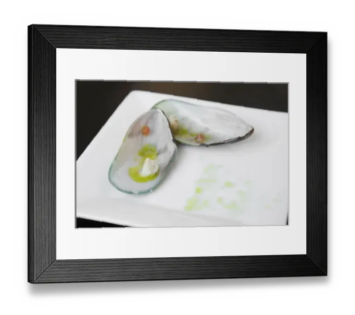 Framed Print : San Juan, Puerto Rico - A mussel is set open on a square plate and drizzled with olive oil Framed Print : San Juan, Puerto Rico - A mussel is set open on a square plate and drizzled with olive oil
