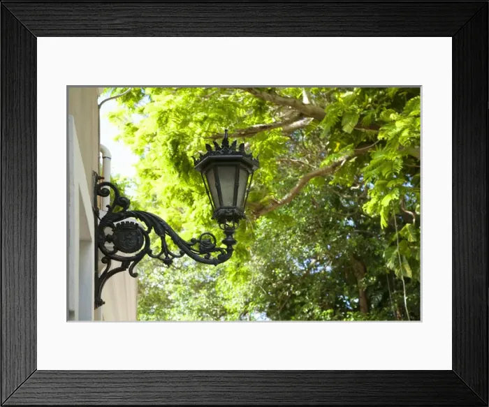 Framed Print : San Juan, Puerto Rico - A Spanish Colonial style ornate lam is mounted on the exterior Framed Print : San Juan, Puerto Rico - A Spanish Colonial style ornate lam is mounted on the exterior