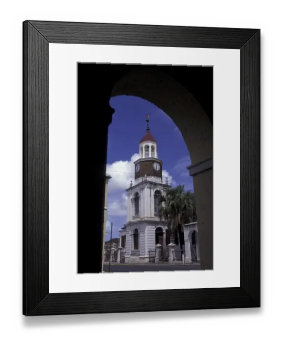 Framed Print : CARIBBEAN, USVI, Saint Croix, Christiansted View of clock tower through arch