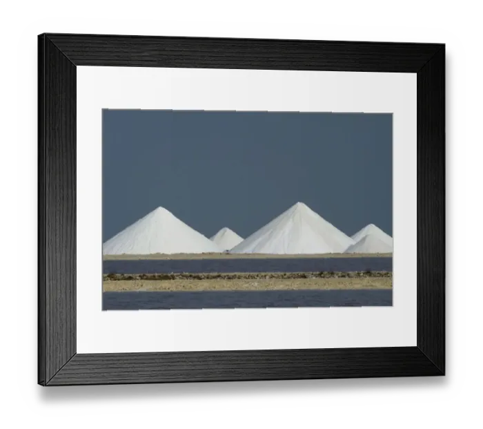 Framed Print : Salt mounds and Evaporation Ponds. Sea Salt Production Plant started in the 1600 s