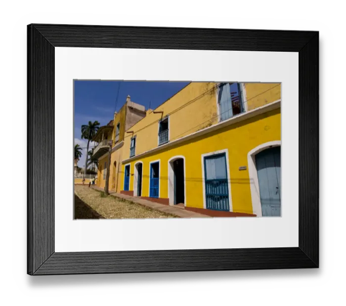 Framed Print : Old yellow building in colonial town of Trinidad Cuba