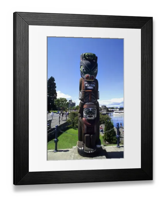 Framed Print : Indian art work of Kwakiutl Bear Totem Pole in beautiful Victoria British Columbia Canada