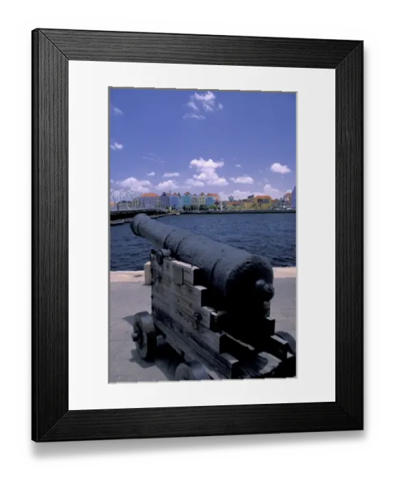 Framed Print : Caribbean, Netherland Antilles, Curacao, Willemstad Fort canon and view of colorful buildings Framed Print : Caribbean, Netherland Antilles, Curacao, Willemstad Fort canon and view of colorful buildings