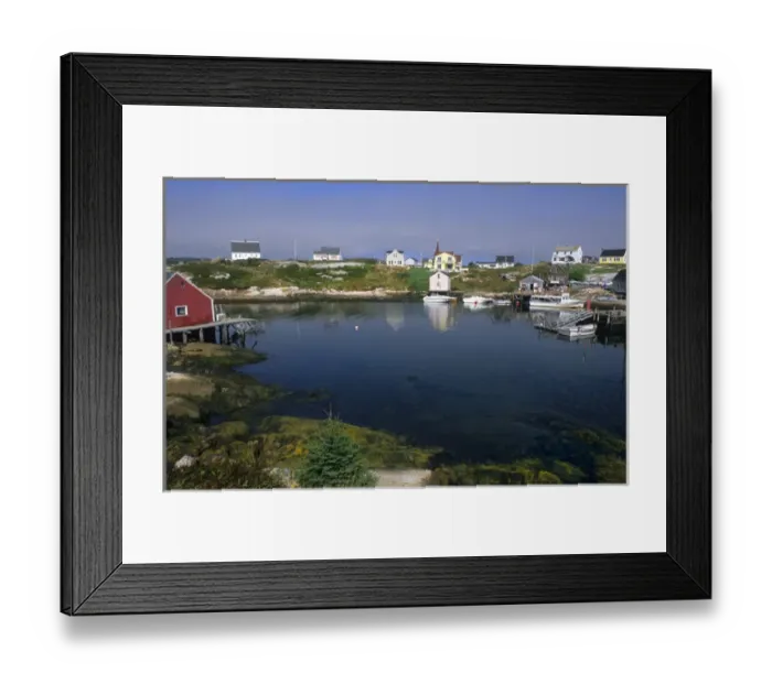 Framed Print : Beautiful village of Peggys Cove with harbour and fishing sheds in Nova Scotia Framed Print : Beautiful village of Peggys Cove with harbour and fishing sheds in Nova Scotia