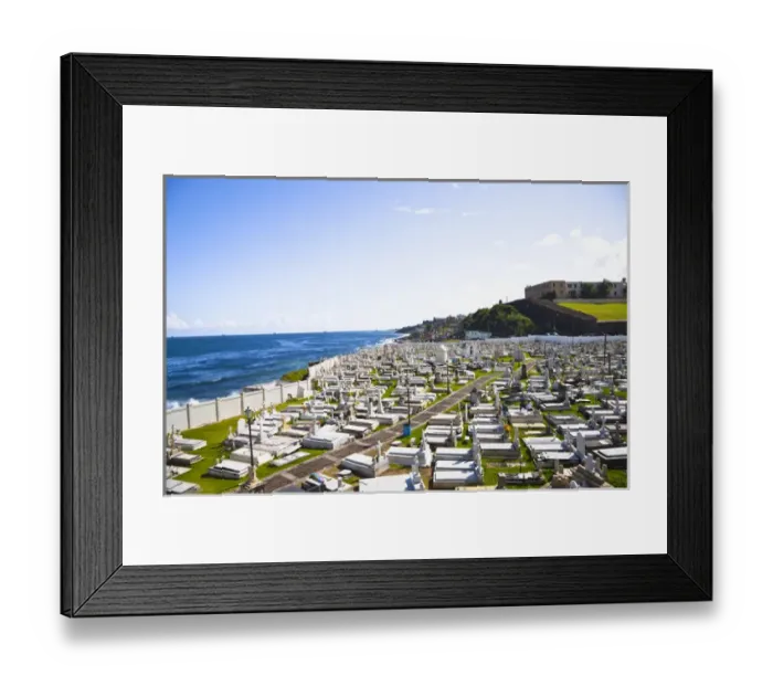 Framed Print : San Juan, Puerto Rico - Tombs and religious statuary mark graves in a cemetery near the ocean Framed Print : San Juan, Puerto Rico - Tombs and religious statuary mark graves in a cemetery near the ocean