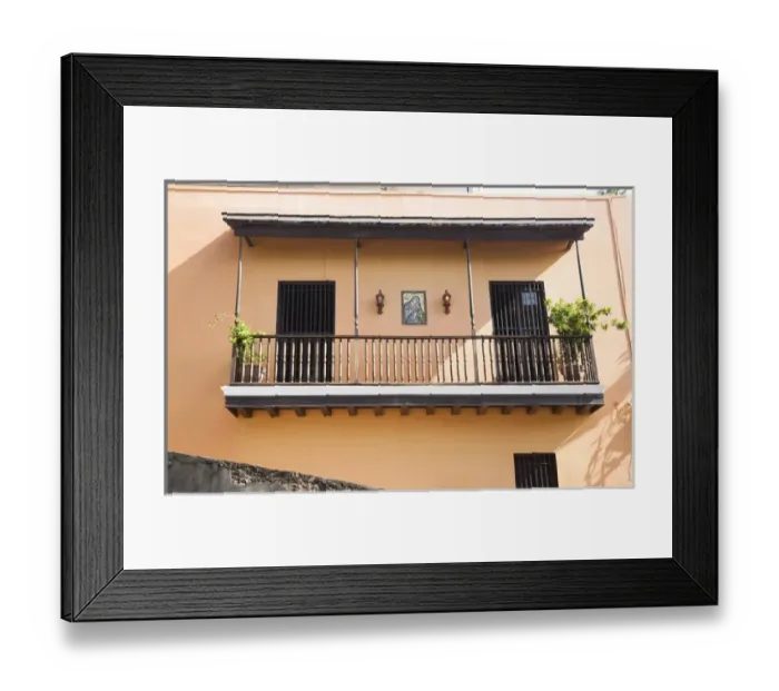 Framed Print : San Juan, Puerto Rico - Two doors with bars on them are set into a peach colored