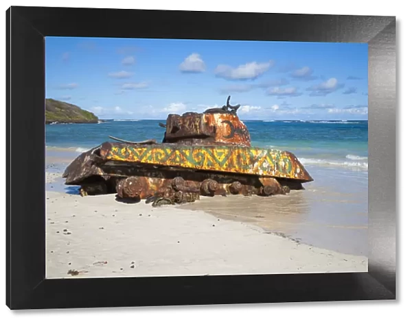 Vieques, Puerto Rico - An old abandoned military tank is sitting on the beach rusting