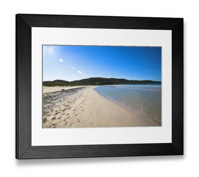 Framed Print : Vieques, Puerto Rico - Gentle waves are rolling up onto the white sands of a tropical beach