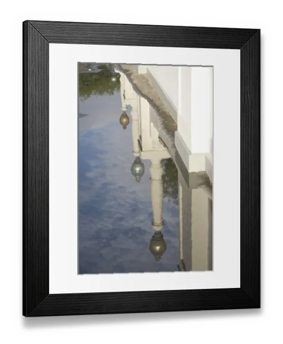 Framed Print : United States, Puerto Rico, Ponce. Reflection of lamp posts in puddle, Plaza Las Delicias Framed Print : United States, Puerto Rico, Ponce. Reflection of lamp posts in puddle, Plaza Las Delicias