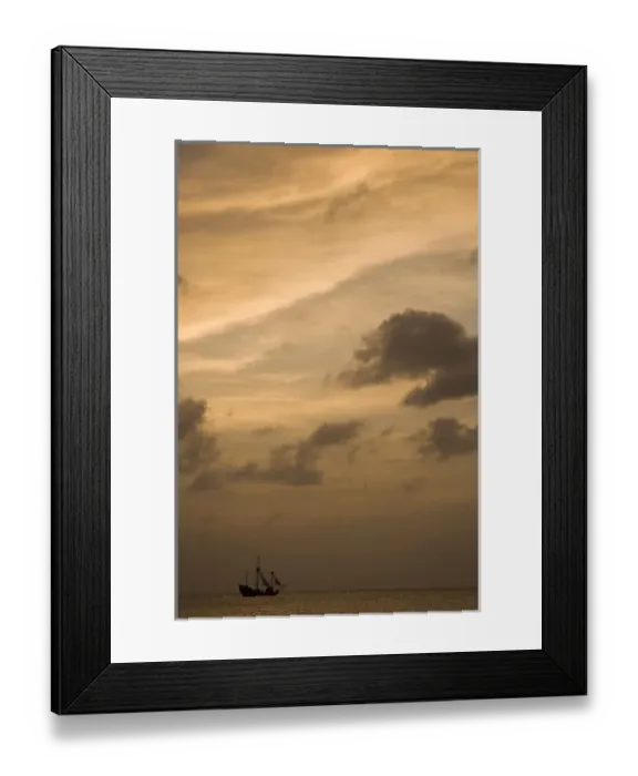 Framed Print : Cayman Islands, Grand Cayman Island, Setting sun silhouettes yacht sailing through Framed Print : Cayman Islands, Grand Cayman Island, Setting sun silhouettes yacht sailing through