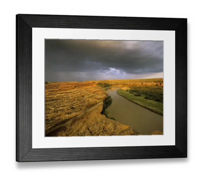Framed Print : Approaching storm on the Milk River at Writing on Stone Provincial Park in Alberta Canada