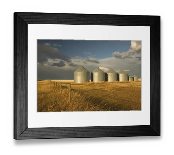 Framed Print : 02. Canada, Alberta, Stand Off: Landscape with Dramatic Sky Grain Silos