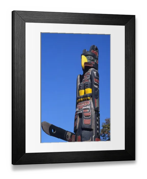 Framed Print : A totem pole In Vancouver, Canada. totem pole, eagle, wood, carving, northwest indians