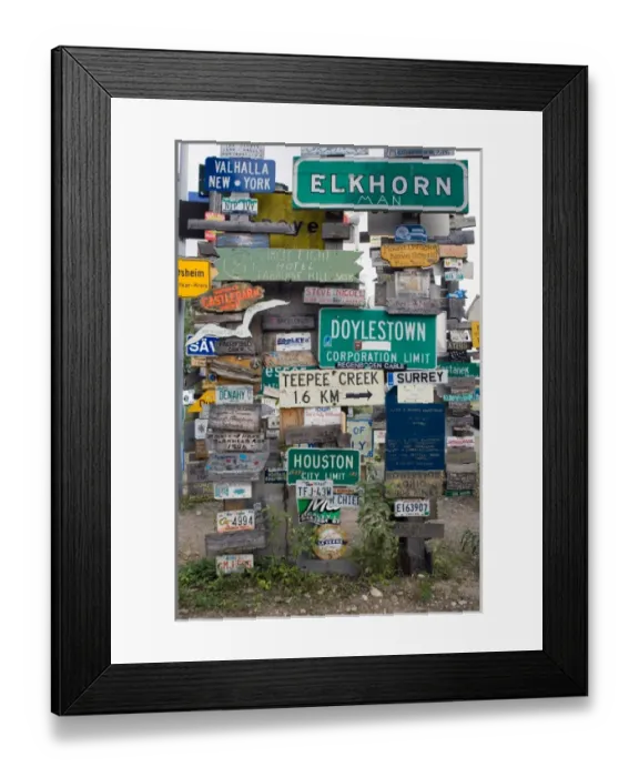 Framed Print : The Sign Post Forest in Watson Lake, Yukon, started in 1942 by Carl K. Lindley, a U