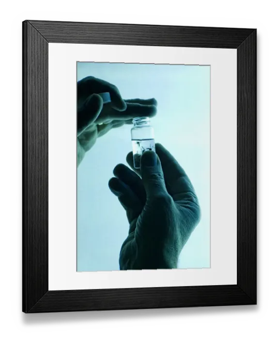 Framed Print : Dr. John McLean collecting mosquitos in alcohol, attracting them using black light Framed Print : Dr. John McLean collecting mosquitos in alcohol, attracting them using black light