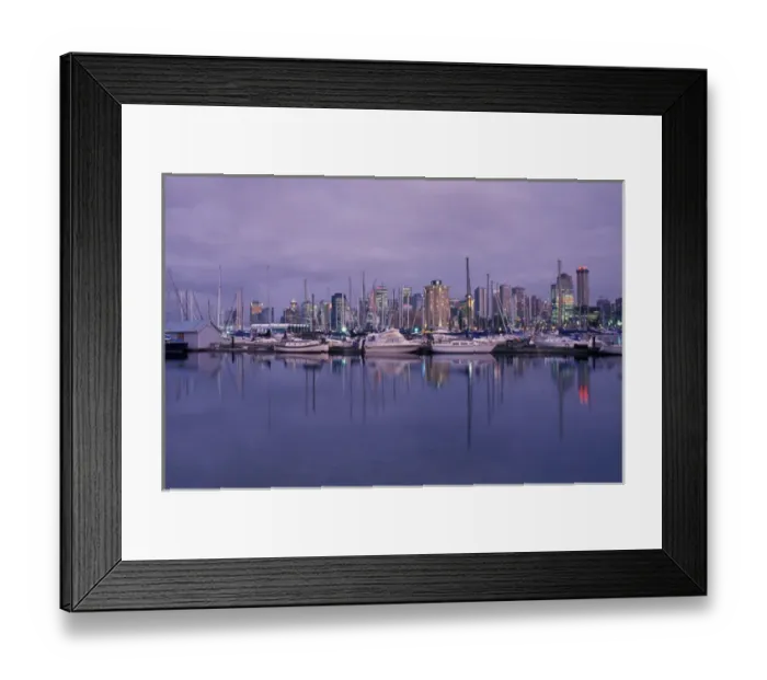 Framed Print : Canada, Vancouver B. C. city skylineand marina from Stanley Park at dusk