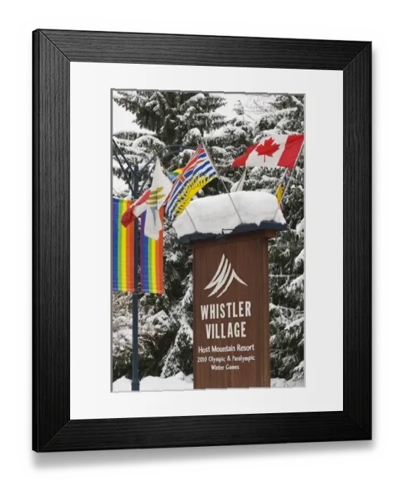 Framed Print : CA, BC, Whistler. Fresh snow piled atop entrance sign to Whistler Village announcing Framed Print : CA, BC, Whistler. Fresh snow piled atop entrance sign to Whistler Village announcing