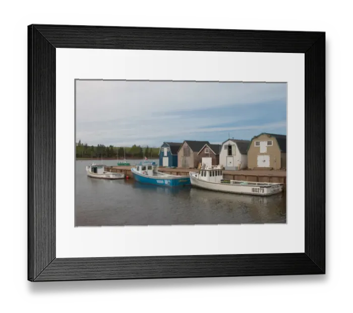 Framed Print : NA, Canada, Prince Edward Island, New London. Fishing sheds and lobster boats in harbour