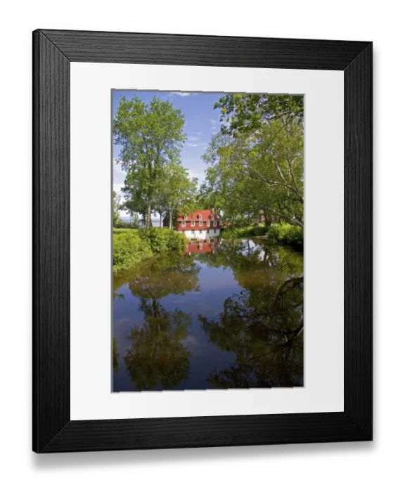 Framed Print : Moulin de Beaumont, a mill built in 1821 near Quebec City, Quebec, Canada