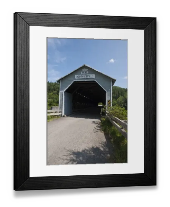 Framed Print : Quebec, Canada. De Routheirville covered bridge over the Matapedia River Framed Print : Quebec, Canada. De Routheirville covered bridge over the Matapedia River