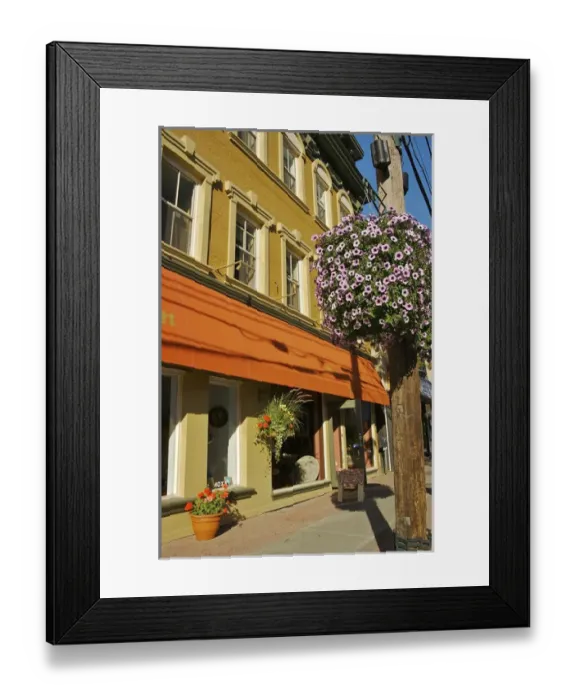 Framed Print : North America, Canada, Quebec, Eastern Townships, Magog. A sunlit street in downtown