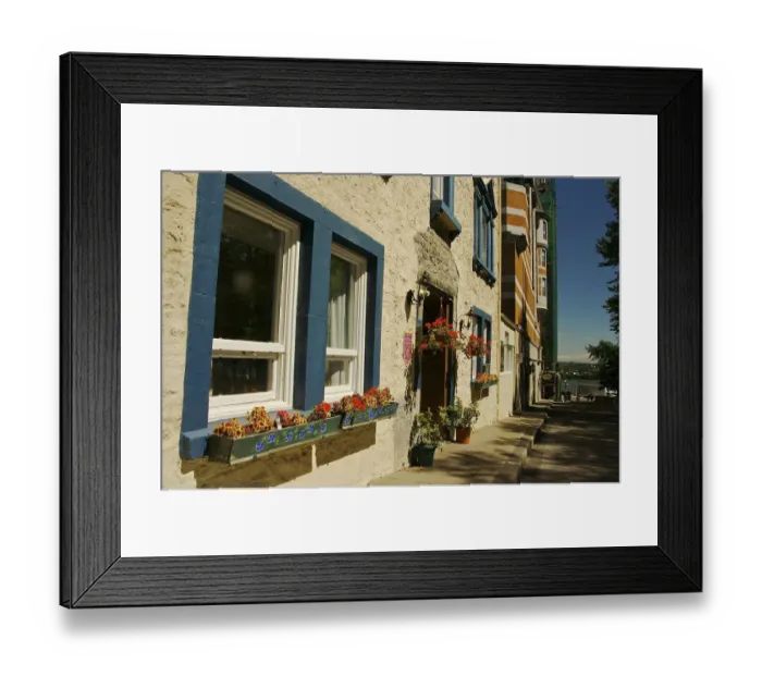 Framed Print : North America, Canada, Quebec, Old Quebec City. Flowers decorate an old stone building