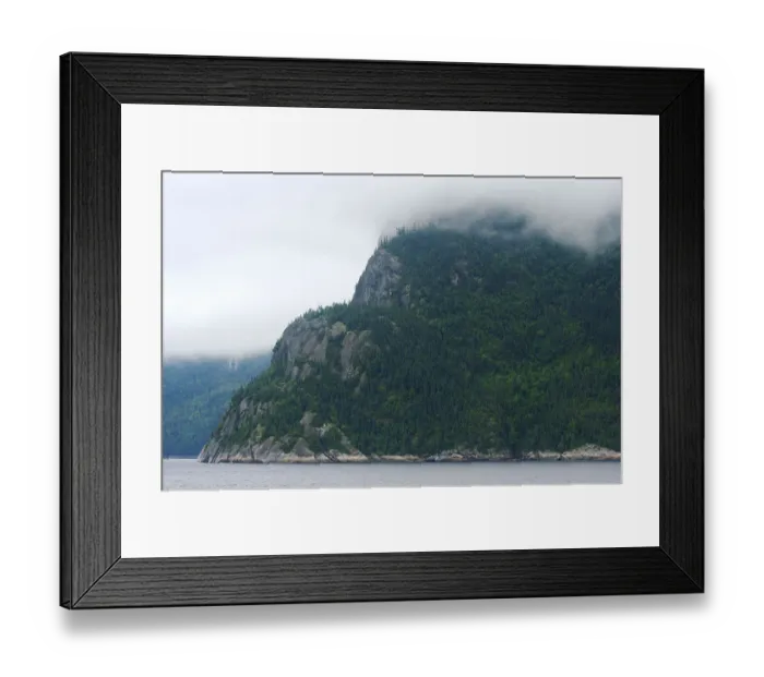 Framed Print : North America, Canada, Quebec, Saguenay. View of the cliffs of Cap Trinite under the mist