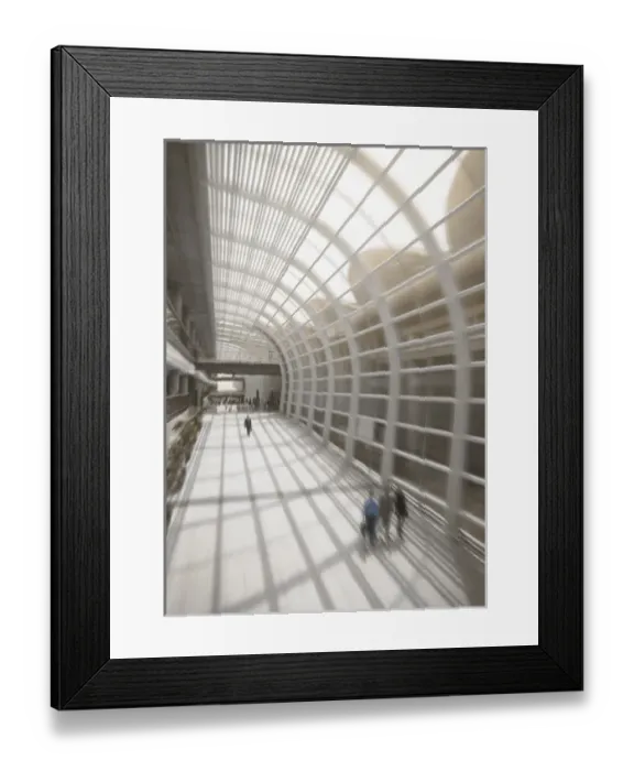 Framed Print : Commerce: Business travelers in modern airport