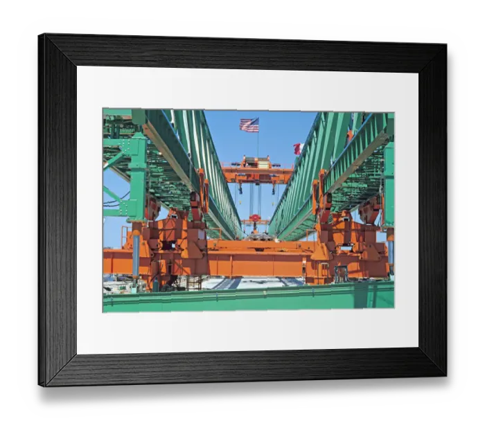 Framed Print : Heavy equipment used for building a bridge Framed Print : Heavy equipment used for building a bridge
