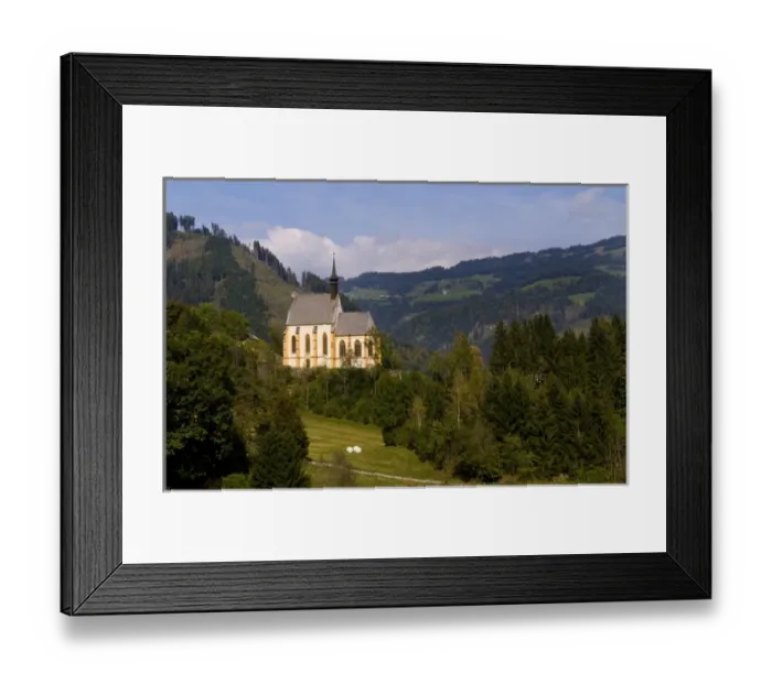 Framed Print : Old historical old church called Parish Church of Murau Austria and mountains